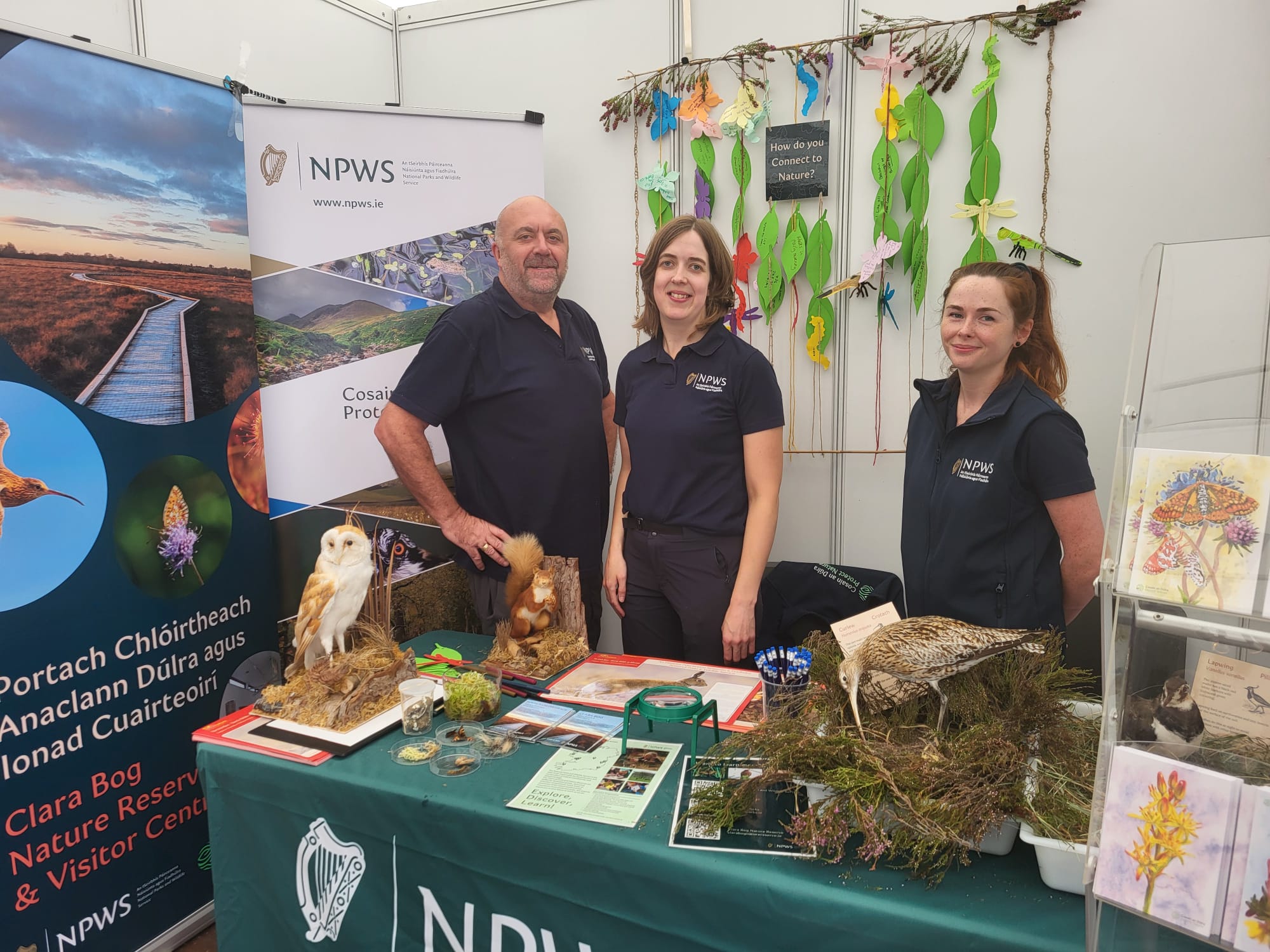 Staffs are standing beside table at Tullamore show